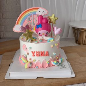My Melody theme custom birthday cake with rainbow topper, pastel decorations and personalized name in Puchong Selangor by The Cake Alchemy