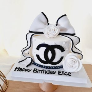 Chanel Luxury inspired designer theme custom birthday cake with handcrafted fondant ribbon, logo and roses in Puchong Selangor by The Cake Alchemy