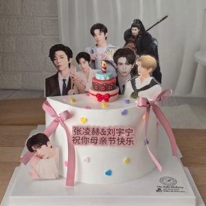Celebrity idol theme custom birthday cake with personalized idol photo toppers and pastel heart decorations in Puchong Selangor by The Cake Alchemy