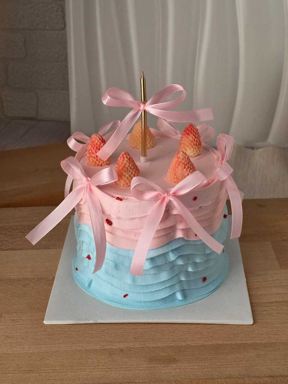 Pastel pink and blue strawberry ribbon cake with handcrafted chocolate strawberries, satin bows, and Korean vintage style decoration by The Cake Alchemy in Puchong Selangor Malaysia.